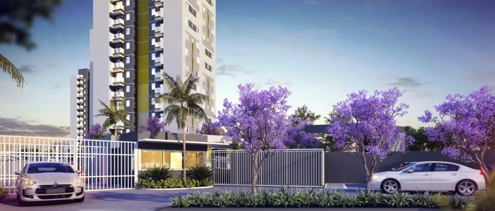 Fachada e portaria com ipês floridos — Morada da Serra