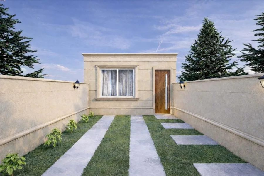 Fachada com jardim e entrada social — Casa com 2 dormitórios sendo uma suíte, garagem e quintal